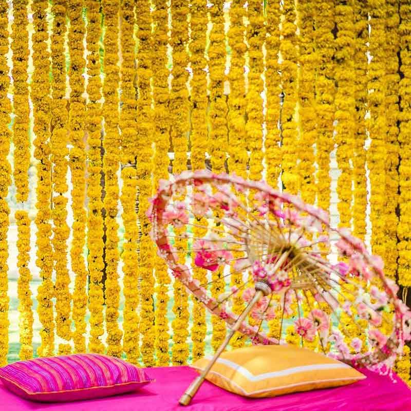 Flower Backdrop for Haldi Ceremony with Decorated umbrella | Grand wedding haldi  backdrop decoration | best wedding haldi backdrop decoration with flowers |  Theme wedding haldi backdrop decoration for open area |