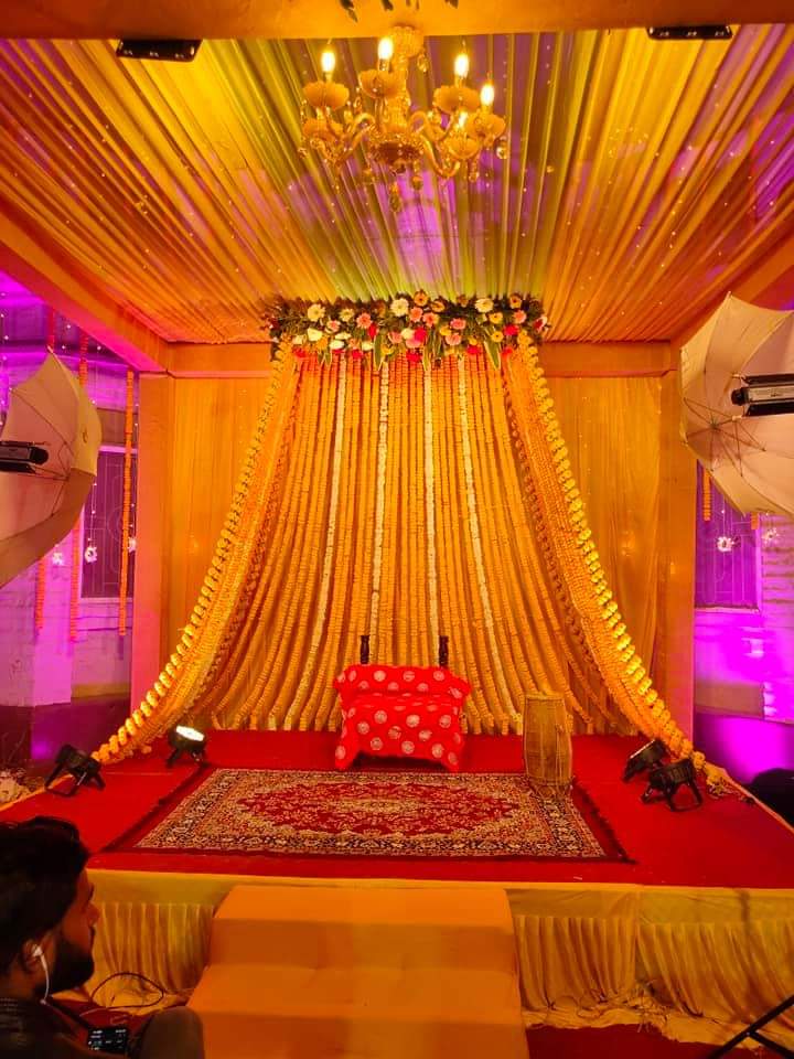 Flower Decorated Backdrop for Haldi | Elegant wedding mandap decoration  with flowers and curtains | Lights decoration for wedding | Theme lights  decoration for wedding | Lamp decoration in wedding | Best