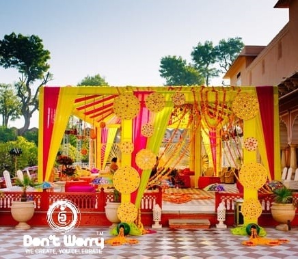 Decorated Mandap for Haldi Ceremony | best wedding haldi backdrop  decoration with flowers | Theme wedding haldi backdrop decoration for open  area | grand haldi backdrop decoration in lawn for wedding |